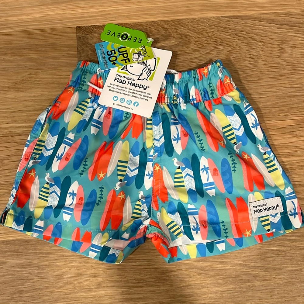 NWT Flap Happy baby swim trunks